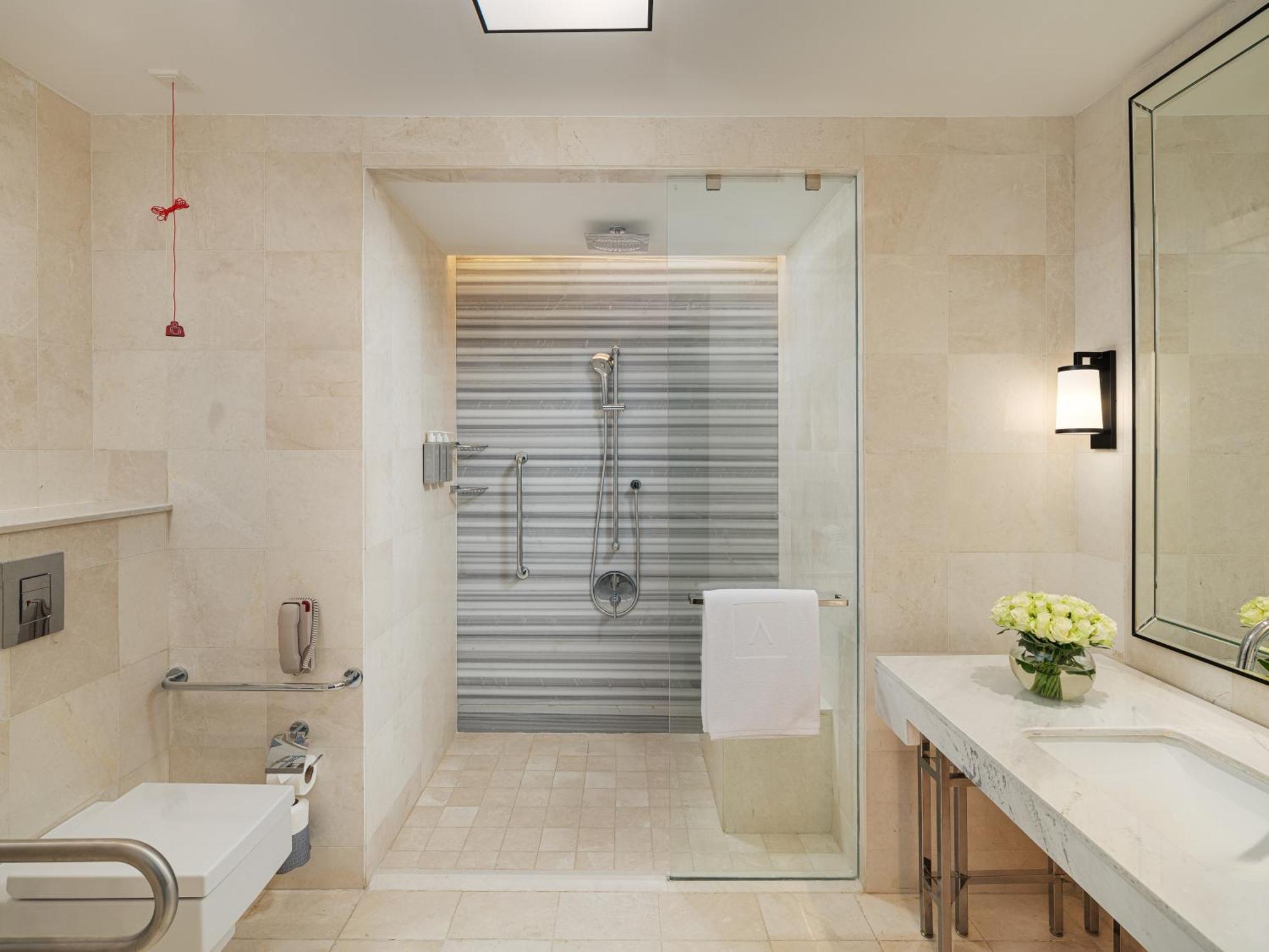 Address Jabal Omar Makkah Aparthotel Mecca Bagian luar foto A shower with a sliding door
